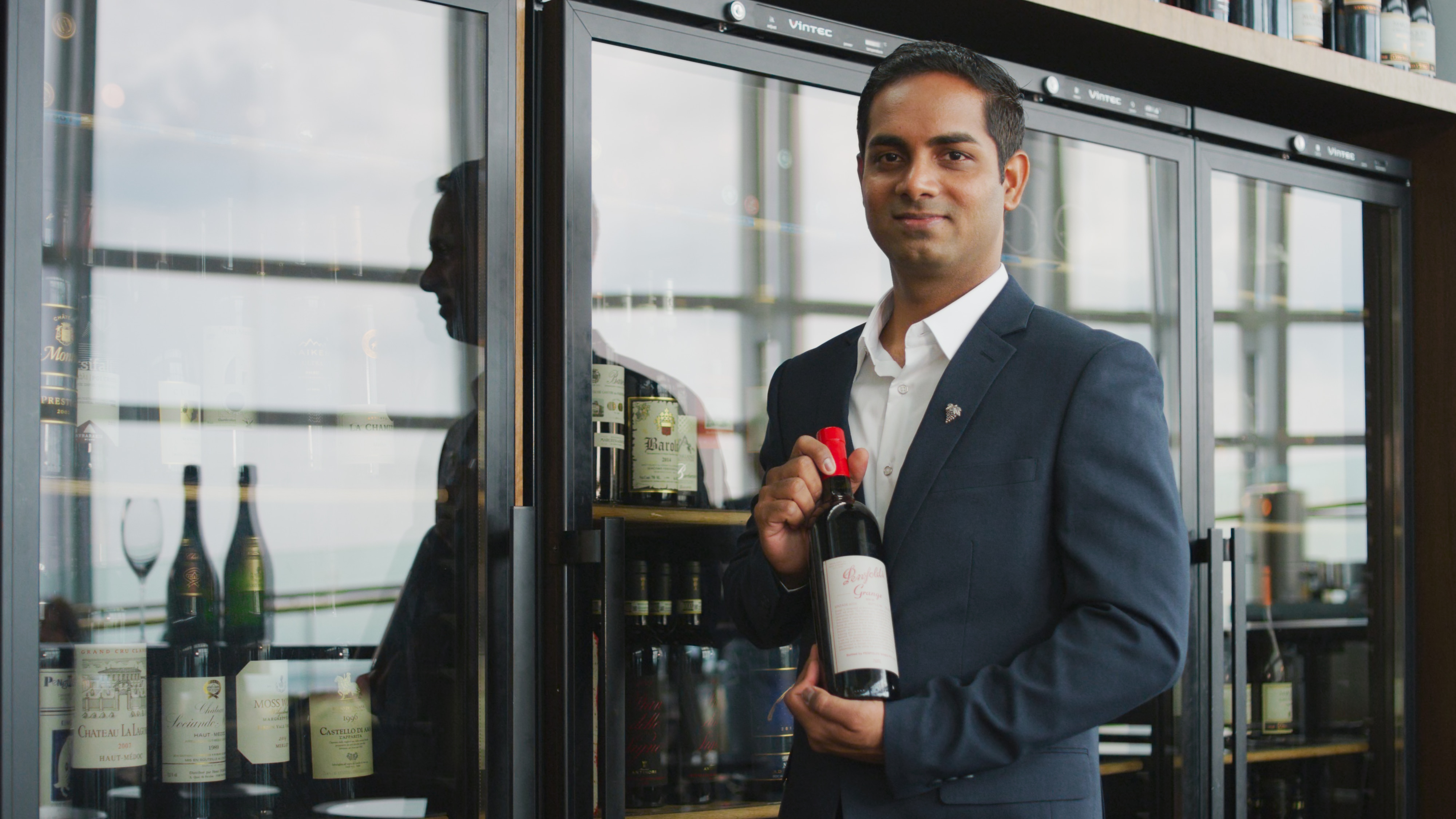 Panneer Selvam, Head Sommelier at Salt Grill & Sky Bar, with Vintec Wine Cabinets